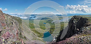 Mountain landscape, a lake in a mountain valley, panoramic view