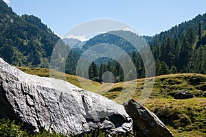 Mountain landscape with a large boulder