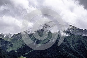 Mountain landscape - mountains forest, rocks glaciers snow clouds, Dombay, Karachay-Cherkessia, Russia