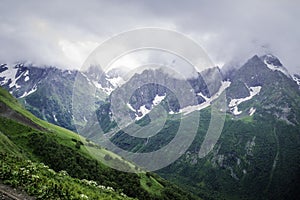 Mountain landscape - mountains forest, rocks glaciers snow clouds, Dombay, Karachay-Cherkessia, Russia