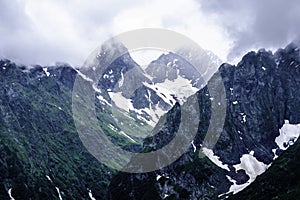 Mountain landscape - mountains forest, rocks glaciers snow clouds, Dombay, Karachay-Cherkessia, Russia