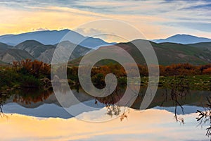 Mountain landscape, reflection in lake