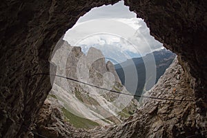 Mountain landscape from rock tunnel, Lagazuoi tunnel, Dolomites, Italian Alps