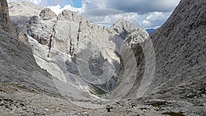 Mountain landscape with rocky passage through mountain massif, Dolomites, Trentino-Alto Adige, Italy