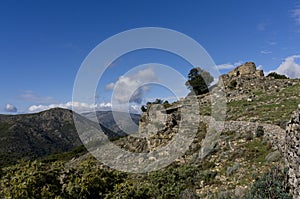 Mountain landscape with sardinian nuraghe