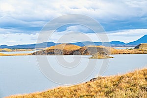 Mountain  landscape in soft colors, blue, green and yellow, Lake MÃ½vatn in autumn colors, Iceland