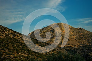 Mountain landscape soft focus peak of rock in twilight lighting time before sunset, blue sky background scenic view