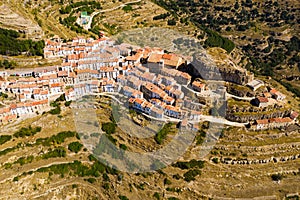 Mountain landscape with Spanish town of Ares del Maestre photo