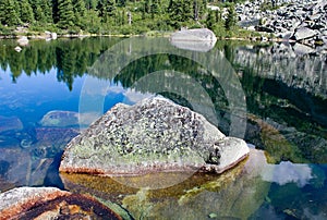 Mountain landscape. Stone on lake of artists.