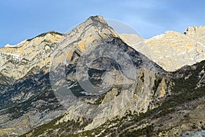 Mountain landscape. Stunning bird's-eye view of a high mountain peak in clear weather