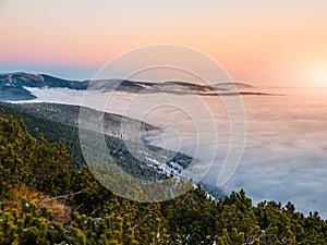 Mountain landscape at sunset time. Freezy evening and weather inversion, Giant Mountains, aka Krkonose, Czech Republic