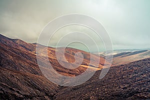 Mountain landscape. Fuerteventira. Canary Islands. Spain photo