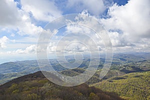 Mountain landscape view haughtily at cloud level far photo