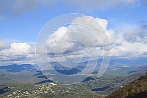 Mountain landscape view haughtily at cloud level far photo