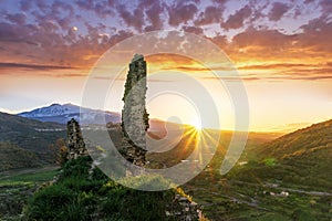 mountain landscape with view from old anciant ruins to a mountain highland plato with white top of vulcan photo