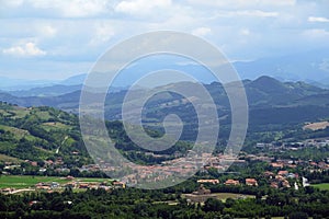 Mountain landscape with a view of a small town Urbania in a North Italy