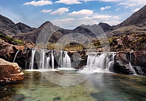 Mountain landscape with waterfall In Isle of Skye, Scotland - Fairy pools