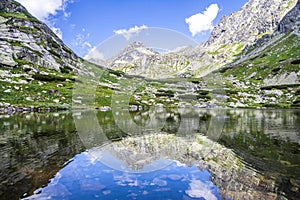 Mountain landscape in the Western Carpathians. Pond Lake Pleso nad Skokom in Mlynicka Valley, Vysoke Tatry High Tatras, Slovakia
