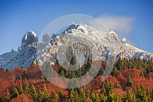 Mountain lanscape in november. Late autumn scene with snow on Ceahlau mountain