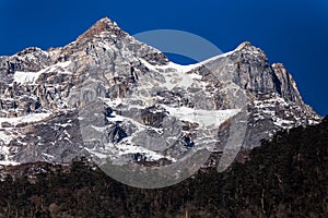 Mountain with little snow on the top sunlight in the morning at Lachen in North Sikkim, India