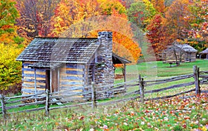 Mountain Log cabins in Fall photo