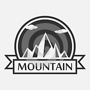 Mountain logo. Template for tourism, alpinism, mountaineering, hiking and camping labels with ribbon. Vector.