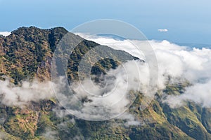 Mountain with Low altitude clouds above. Rinjani mountain, Lombok, Indonesia