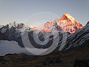 Mountain Machapuchare, ridge and moon photo