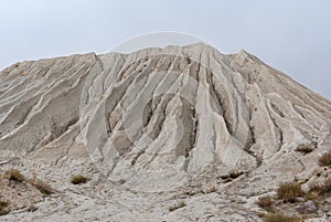 Mountain made from macadam and sand in open-pit mining
