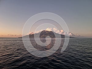 Mountain in the middle of the ocean photo