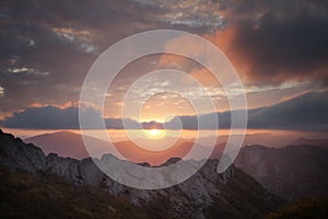 Mountain in the mist at sunset