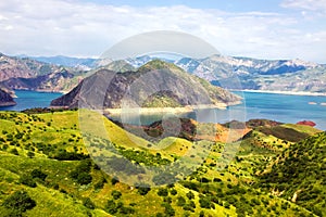 Mountain morraine lake under blue sky