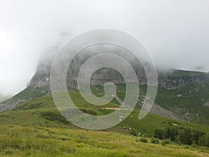 Mountain natural landscape. Mountains, meadows, blue sky, sunny weather