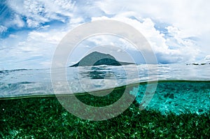 Mountain over the sea view bunaken sulawesi indonesia underwater