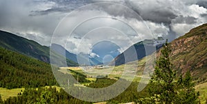 Mountain panorama in Altai with Aktash in the valley, Russia