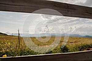 mountain panorama with a cloudy sky on a spring day
