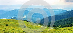 Mountain panorama on cloudy summer noon