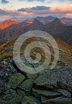 Mountain panorama landscape at dramatic sunset. Alpine tourism