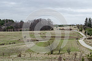 Mountain panorama and machine or lorry with jib-crane arrange pile or stack of wood logs, Plana mountain