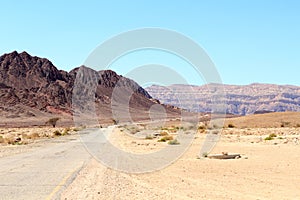 Mountain panorama with road to Timna Valley Park in Negev Desert near Eilat, Israel