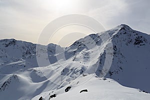 Mountain panorama with snow and blue sky in winter in Stubai Alps