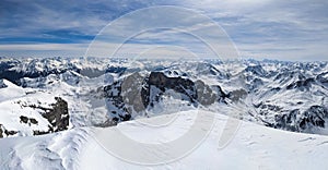 Mountain panorama from the Sulzfluh summit. Winter mountain panorama. Many peaks on the horizon. High quality photo