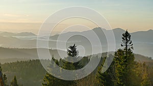 Mountain panorama after sunrise. Early autumn. View from the top of Velka Raca Poland