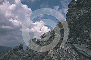 Mountain panorama from top of Banikov peak in Slovakian Tatra mountains with rocky landscape and shadows of hikers in bright day