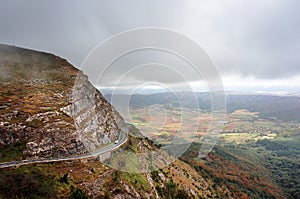 Mountain pass with a road and a car