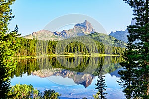 Mountain peak and clean lake