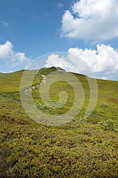 Mountain peak landscape, blue sky and white clouds Poland