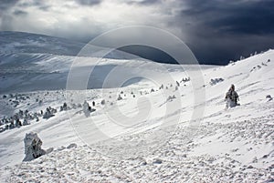 Mountain peak lanscape against snow storm