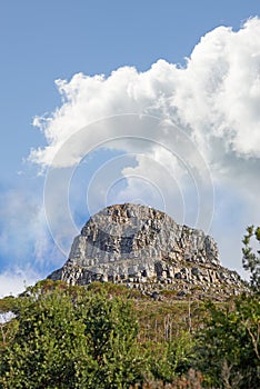 Mountain, peak and natural landscape with cloudy sky, summer and serene hill with forest trees. Nature, tranquil cliff