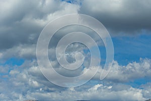 Mountain peak snow clouds blue sky, epirus Ioannina Greece Mitsikeli pea